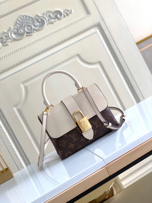 lock handbag white and brown