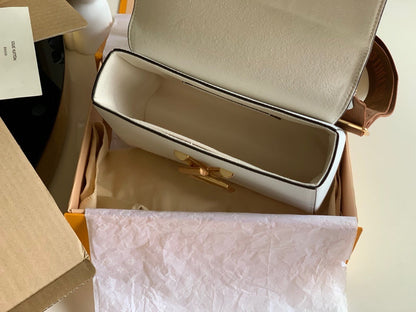 mon white handbag