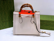 G u c c i white 20x 16x 10 or 27x 24x 11