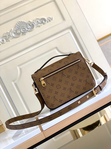 metis brown handbag